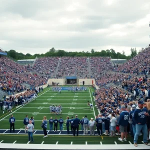 Fans cheering at a McCallie Blue Tornado football game