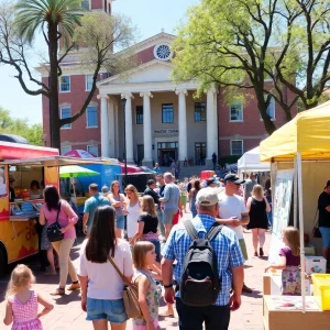 Families enjoying the Santa Ana Spring event with music and food trucks