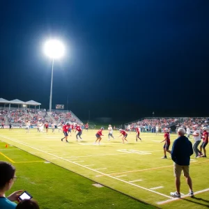 High school football game in Orange County with players and fans
